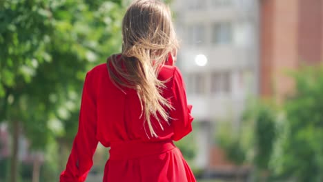 woman talking on phone. young charming woman calling with cell phone while walking in park