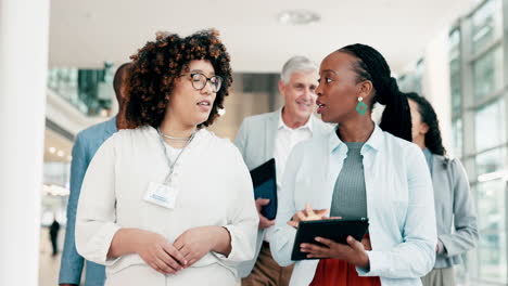 tablet, consulting and walking business women