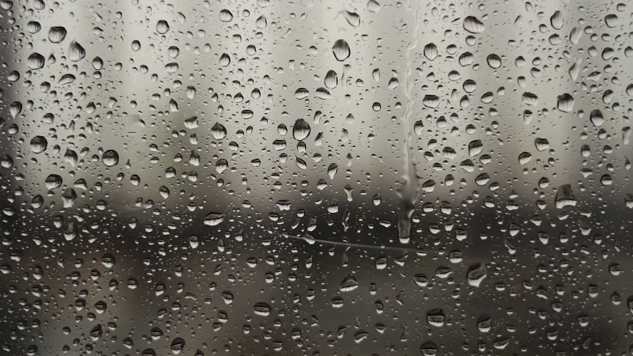 Water drops on the window on a rainy day