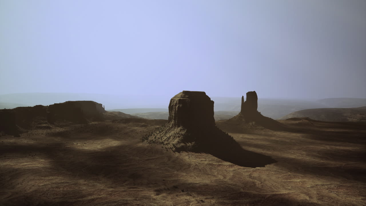 Alba sulle iconiche formazioni rocciose di Monument Valley nel deserto