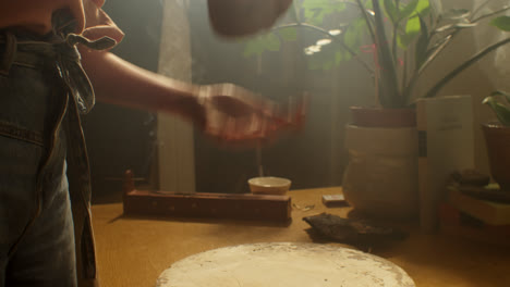 woman crafting with clay