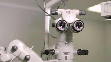 close-up view of a high-tech microscope used in ophthalmological surgeries.