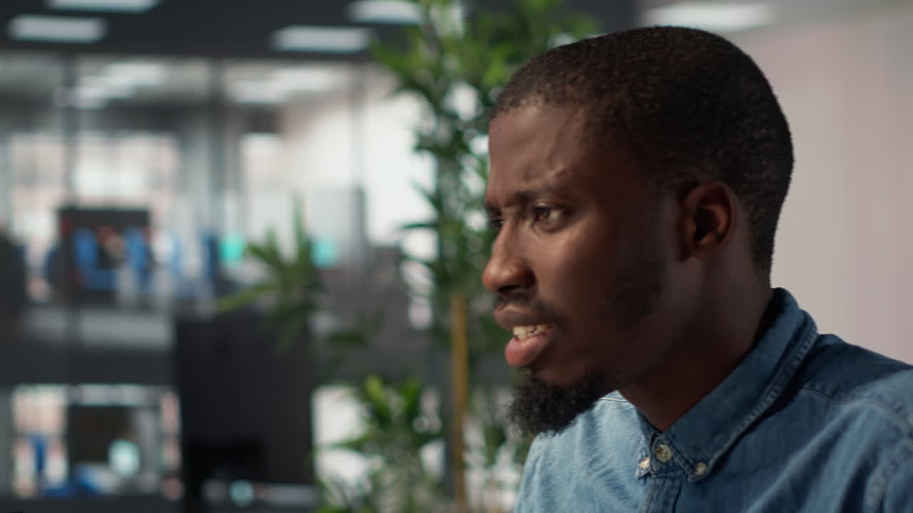 Man in Office Conversation