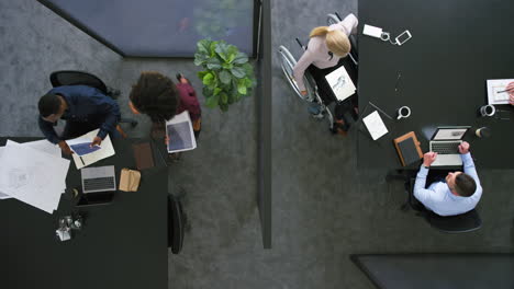 overhead of inclusive colleagues having a meeting