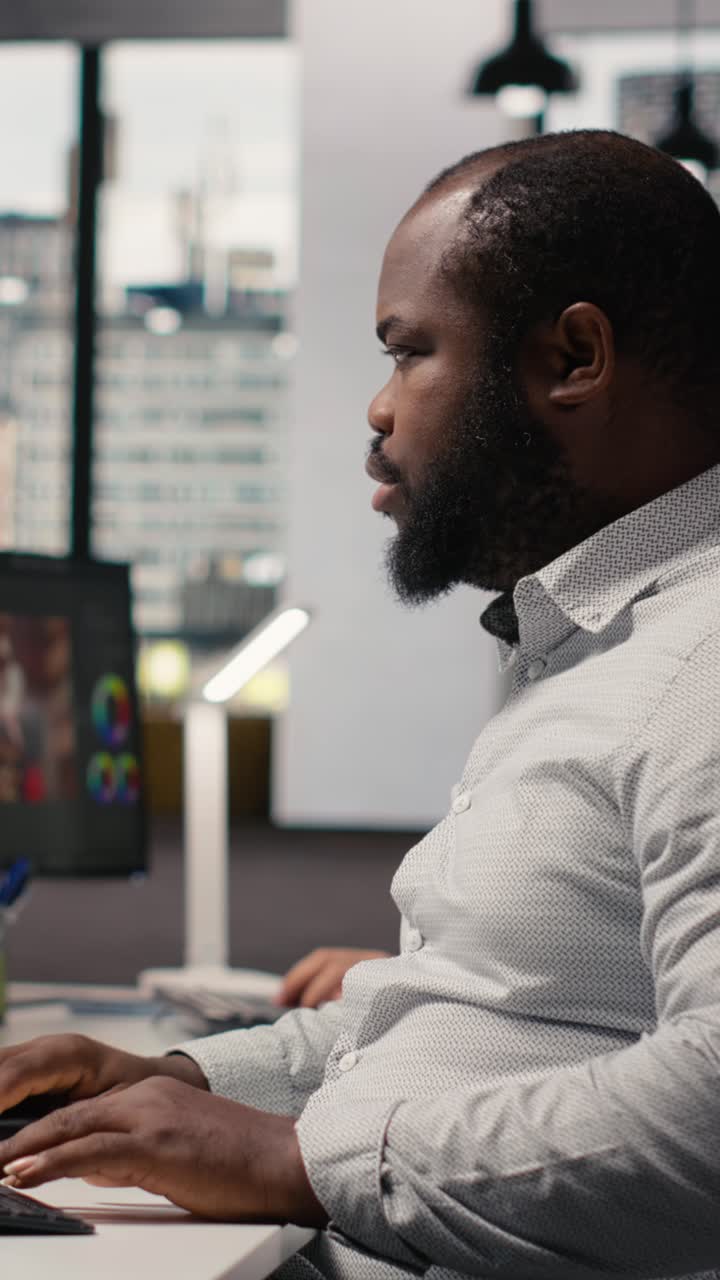 Vertical Video African American Filmmaker Editing Video Footage For Content Production