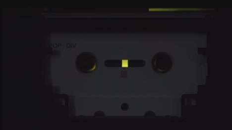 an old cassette player and its digital display with horizontally movement