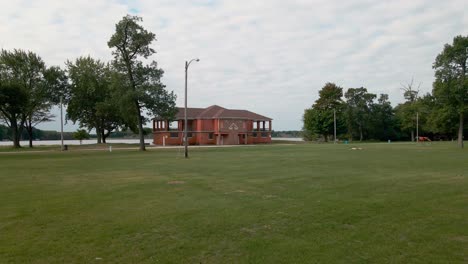 pushing forward and above the old pavilion at mona lake park