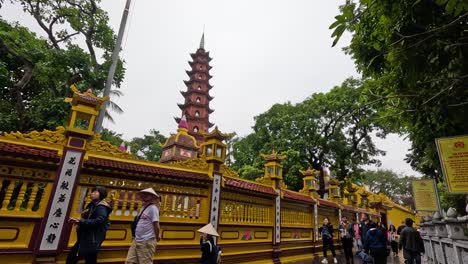 tourists exploring the historic tran quoc pagoda