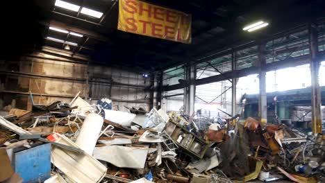 tin and steel cans, aluminum, and sheet metal in a recycling plant