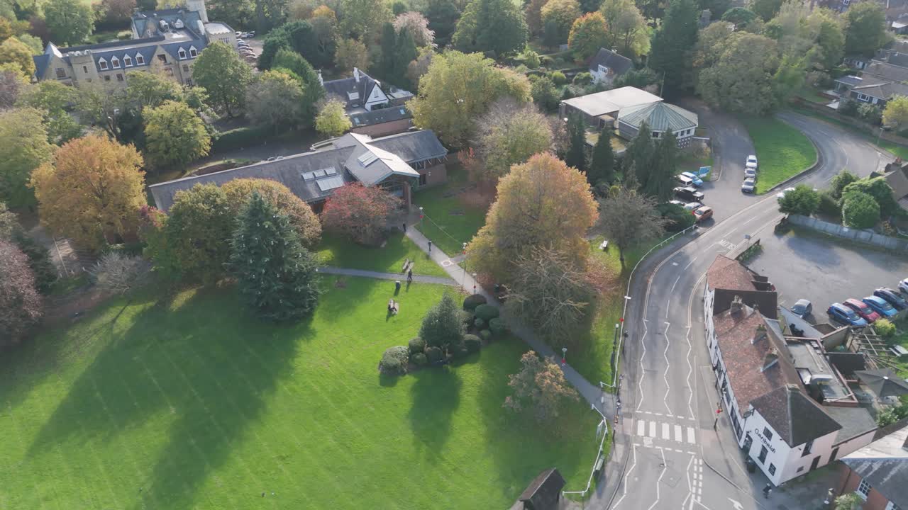 Aerial View of a Park and Building in Autumn