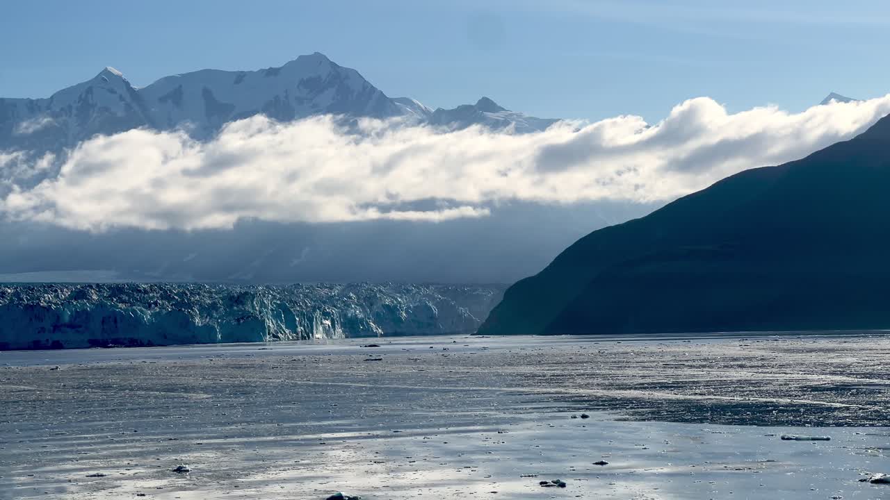 icy water and clouds at the hubbard glacier in alaska