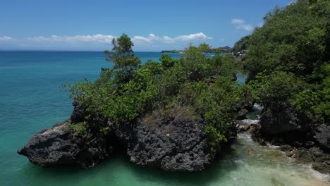 blue skies and vibrant beach scenes in uluwatu in the south of bali, indonesia