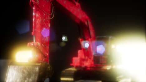 excavadora en la oscuridad con luces brillantes