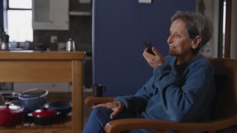 Senior-woman-relaxing-alone-at-home