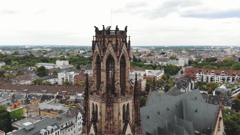 4k drone footage circling the historical tower of the great saint martin church in cologne, germany