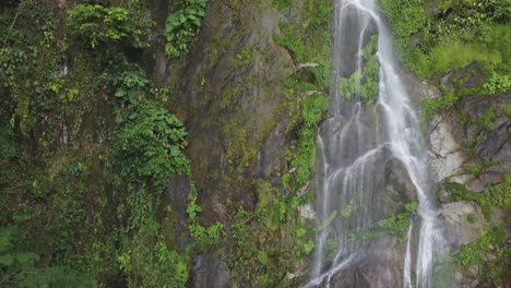 aerial ascent of beautiful cascada el bejuco waterfall in honduras