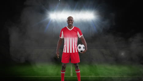 animation of stadium and smoke over african american male soccer player