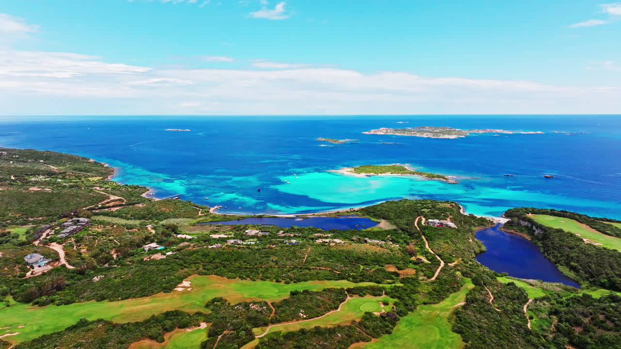 Aerial drone view of beautiful coastline of Corsica, France. High view of the colorful turquoise sea and the picturesque green landscape. Bird's eye view of the beaches. Summer holidays destination