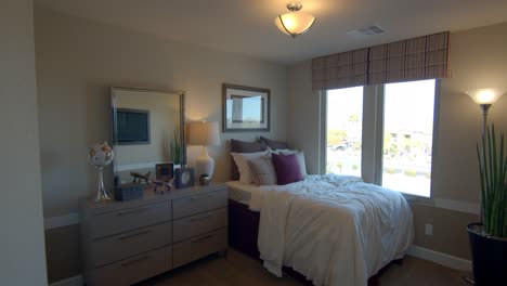 the spacious single bedroom in las vegas nevada with modern design ideas overlooking outside the glass window - wide shot