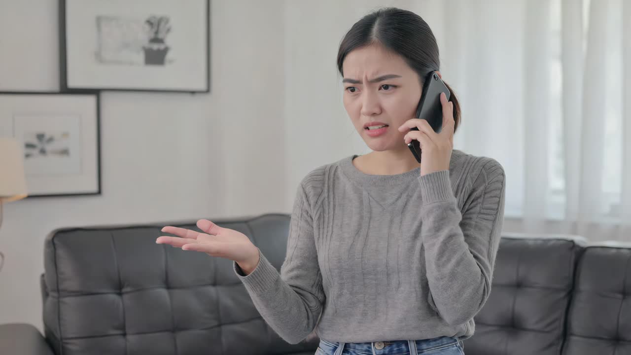 Upset woman on a phone call