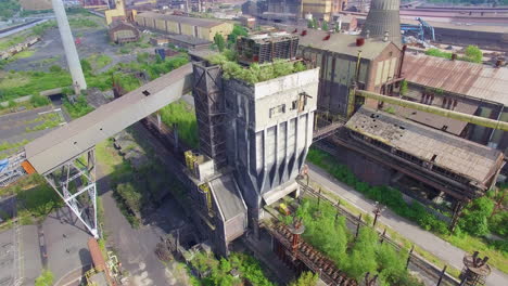 Aerial-drone-footage-of-an-old,-abandoned-coke-coal-factory-Carsid-in-Charleroi