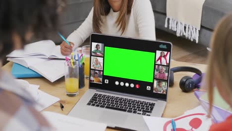 Diverse-students-having-laptop-video-call-with-copy-space-and-schoolchildren-in-slow-motion