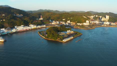 aerial flying towards mikimoto pearl island in toba city, mie prefecture japan