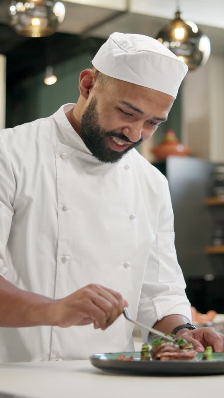 Chef plating food in a professional kitchen