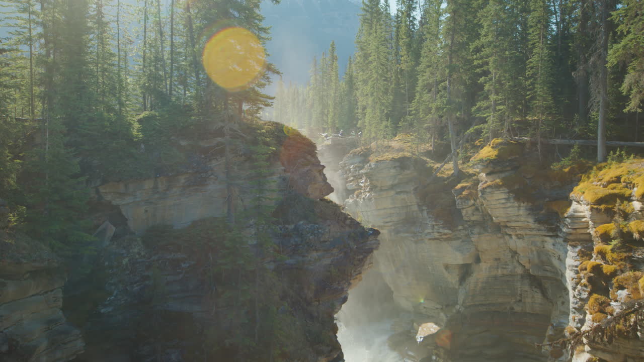 Athabasca River Waterfall Dropping Down in Narrow Gorge, Jasper National Park, Alberta, Canada