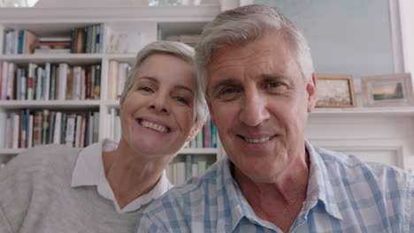 happy-old-couple-having-video-chat-using-webcam-waving-at-grandchildren-enjoying-chatting-to-family-online-sharing-lifestyle-relaxing-at-home-on-retirement-4k