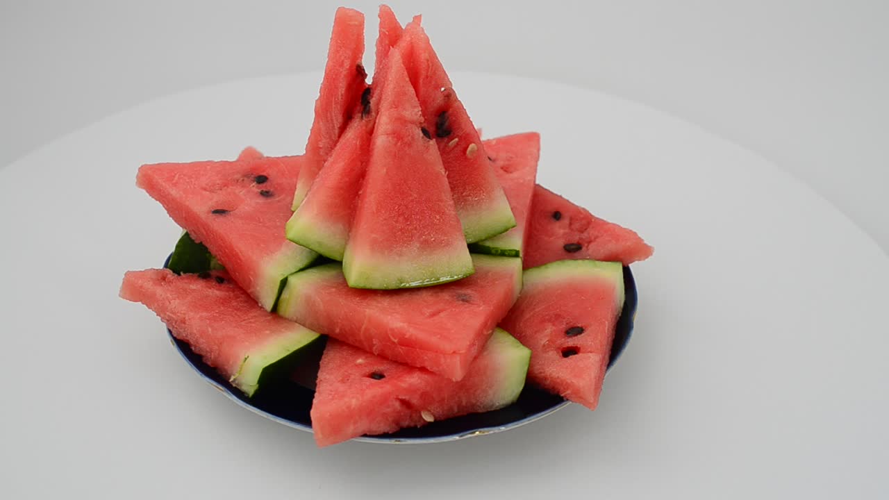 Shooting of a dish from a watermelon. Shooting in the movement