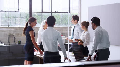 female boss holds a brainstorming meeting in a modern office