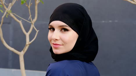 side view of girl in hijab abaya