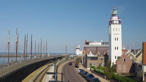 coastal town with lighthouse and harbor view