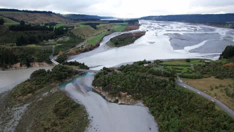 bridge over rakaia river in canterbury, south island, new zealand. - aerial shot