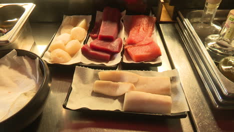 sushi bar display of fresh fish