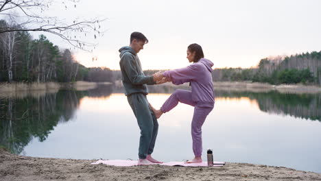 couple doing exercises outdoors