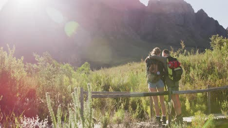 caucasian couple hiking in nature