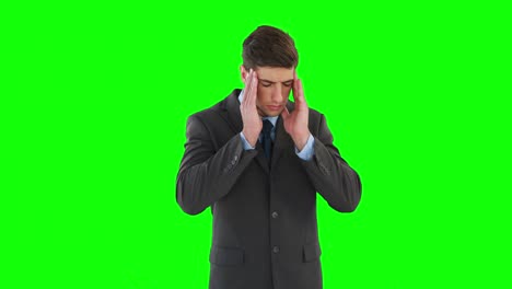 businessman getting a headache