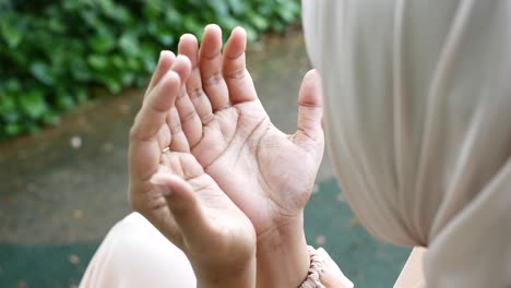 close up of muslim women hand praying at ramadan