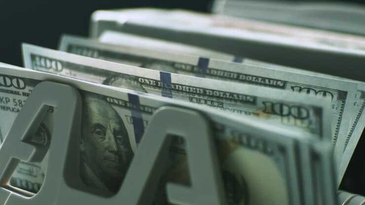 Hundred Dollar Bills in a Bill Sorter