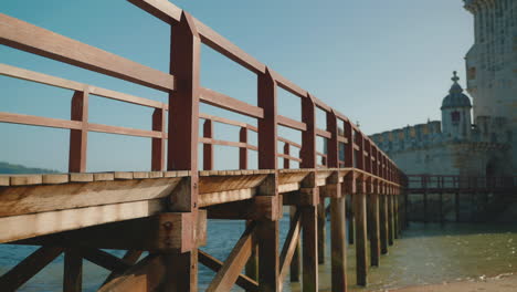 wooden walkway to belém tower in lisbon, portugal