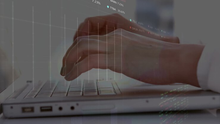 Animation of statistical, stock market data processing over mid section of a man using laptop