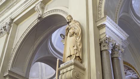 statue of a saint in a church interior