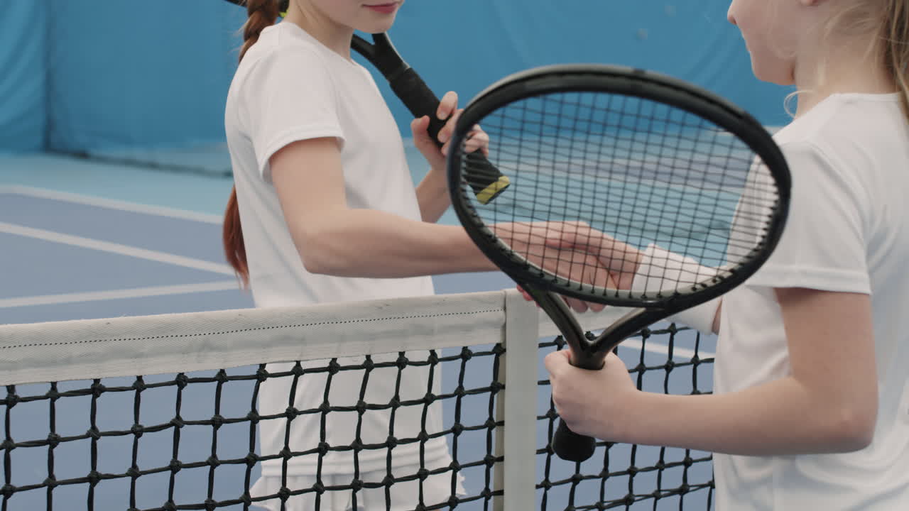 Little Tennis Players Shaking Hands Before Match