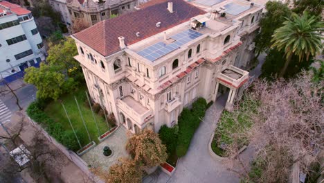 Aerial-view-dolly-in-the-Bruna-Palace-Italian-Renaissance-style-mansion-in-the-bohemian-Lastarria-neighborhood,-Santiago-Chile