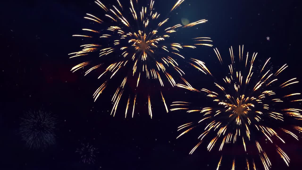 explosión luces doradas chispas luz brillante fuegos artificiales explosiones animación de bucle