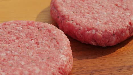 raw hamburger patties