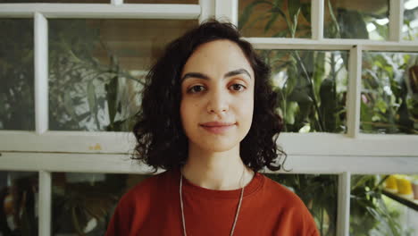 Portrait-of-biracial-Girl-in-Flower-Shop