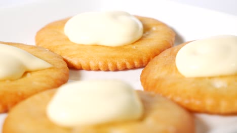 round crackers with mayonnaise